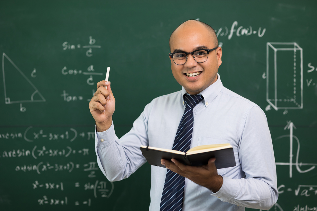 Young asian teacher man teaching video conference with student. Male Indian teacher training the mathematics in classroom from online course.